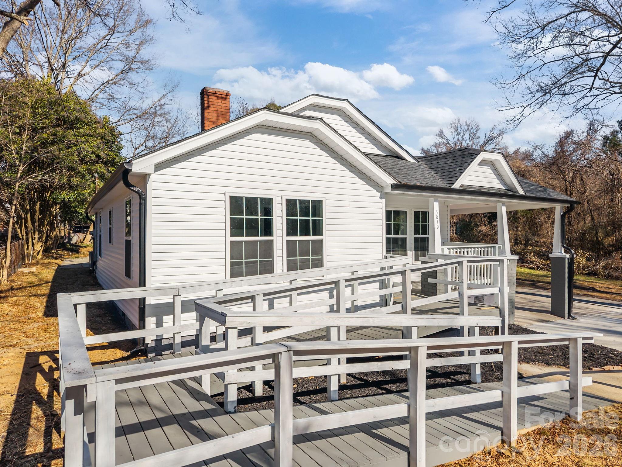 5010 Athens Street Kannapolis, NC 28081 - Photo 7 of 36 a view of a house with wooden deck and furniture