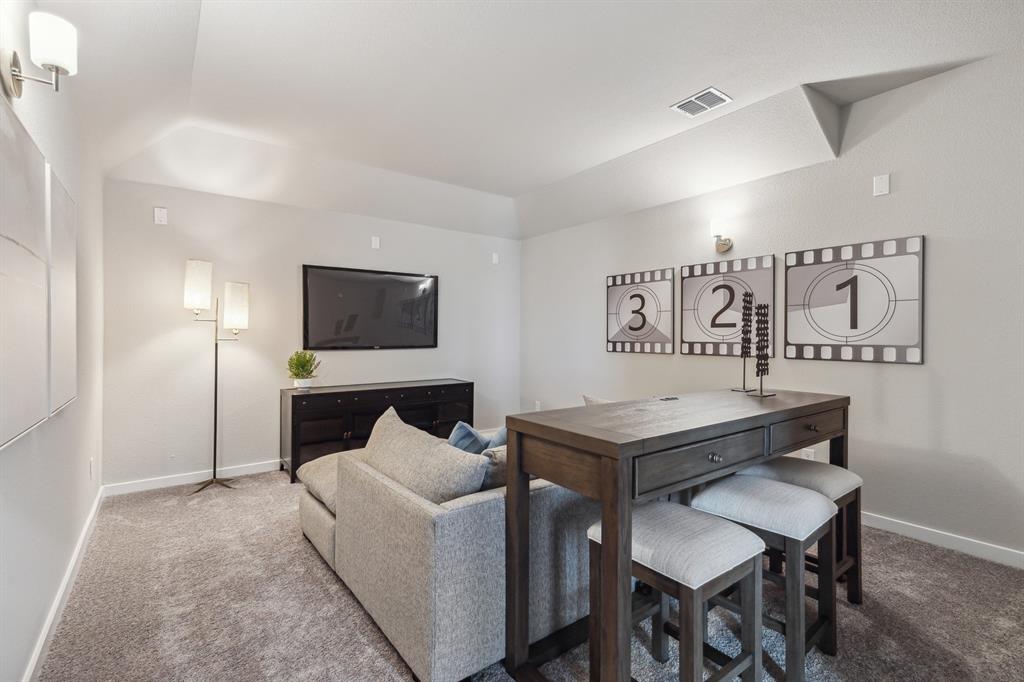 1129 Del Rio Drive Lavon, TX 75166 - Photo 27 of 28 Media room in the Wimbledon home plan by Trophy Signature Homes – REPRESENTATIVE PHOTO