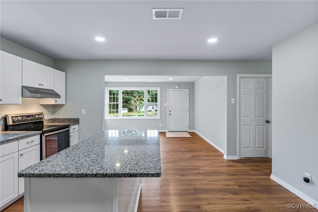 8600 Hickory Road Petersburg, VA 23803 - Photo 12 of 28 Kitchen with a center island, dark hardwood / wood