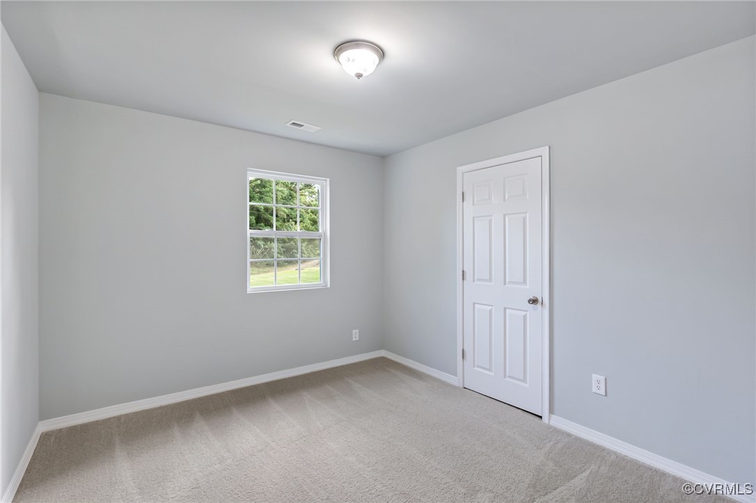 8600 Hickory Road Petersburg, VA 23803 - Photo 17 of 28 Unfurnished room featuring carpet flooring