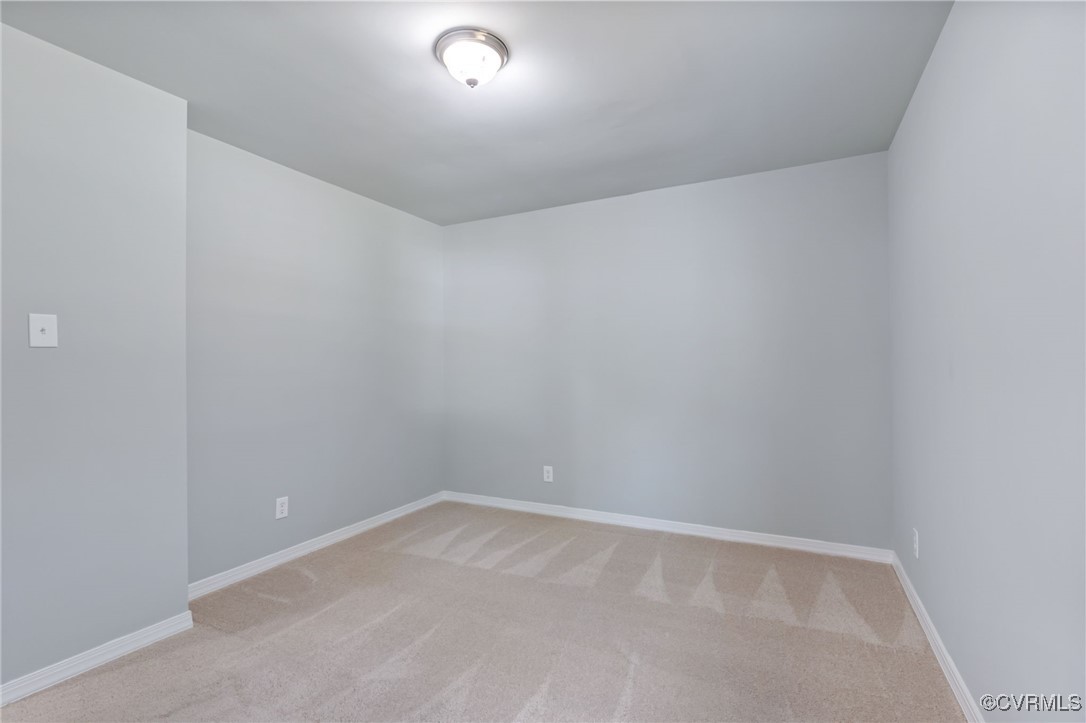 8600 Hickory Road Petersburg, VA 23803 - Photo 18 of 28 Spare room featuring light carpet