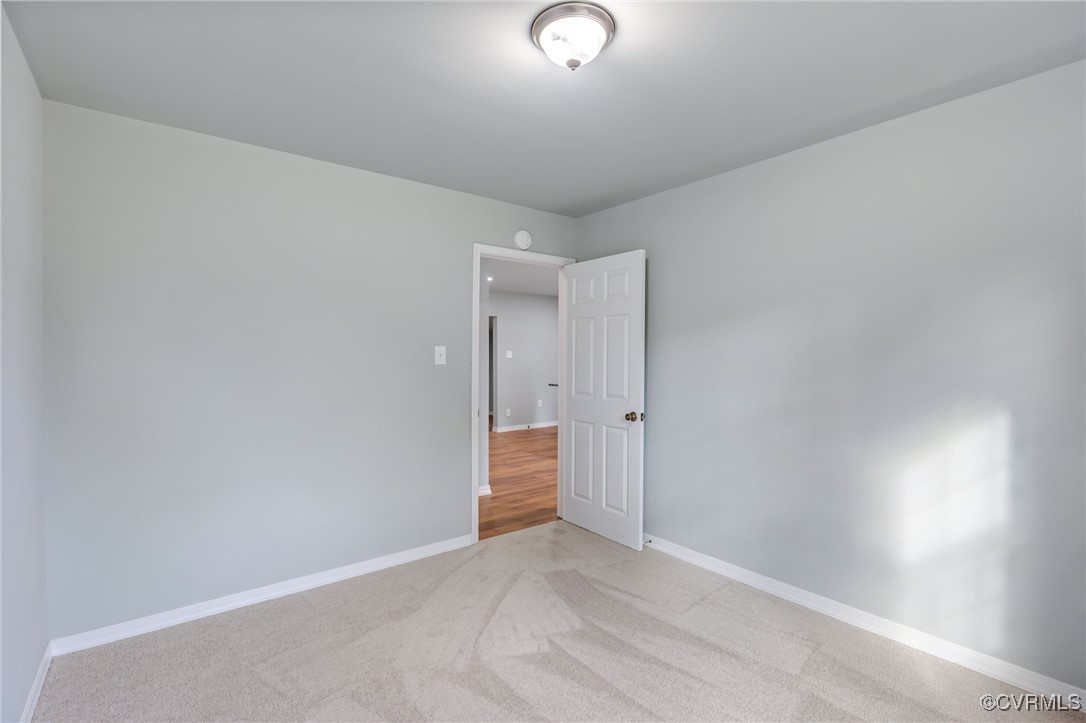 8600 Hickory Road Petersburg, VA 23803 - Photo 21 of 28 View of carpeted empty room