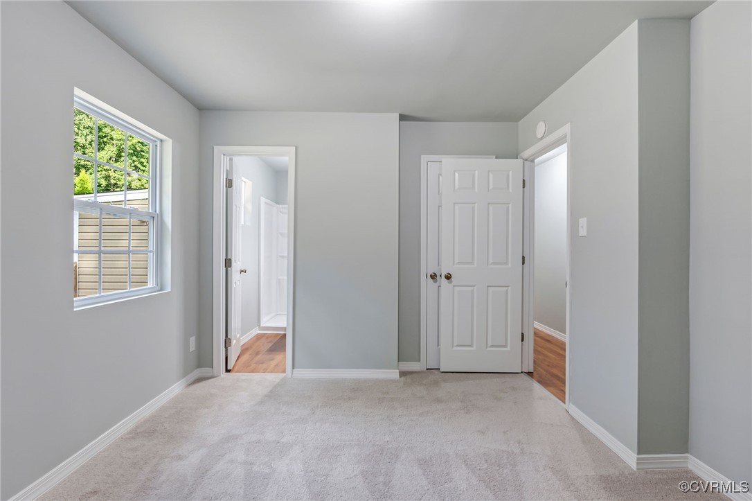 8600 Hickory Road Petersburg, VA 23803 - Photo 23 of 28 Unfurnished bedroom featuring light colored carpet