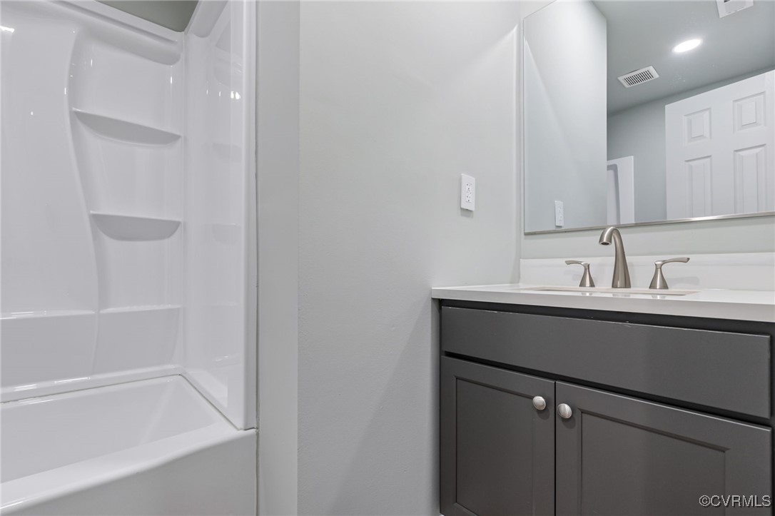 8600 Hickory Road Petersburg, VA 23803 - Photo 25 of 28 Bathroom featuring vanity and shower / tub combina