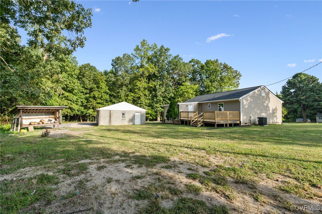 8600 Hickory Road Petersburg, VA 23803 - Photo 26 of 28 View of yard with an outdoor structure and a woode