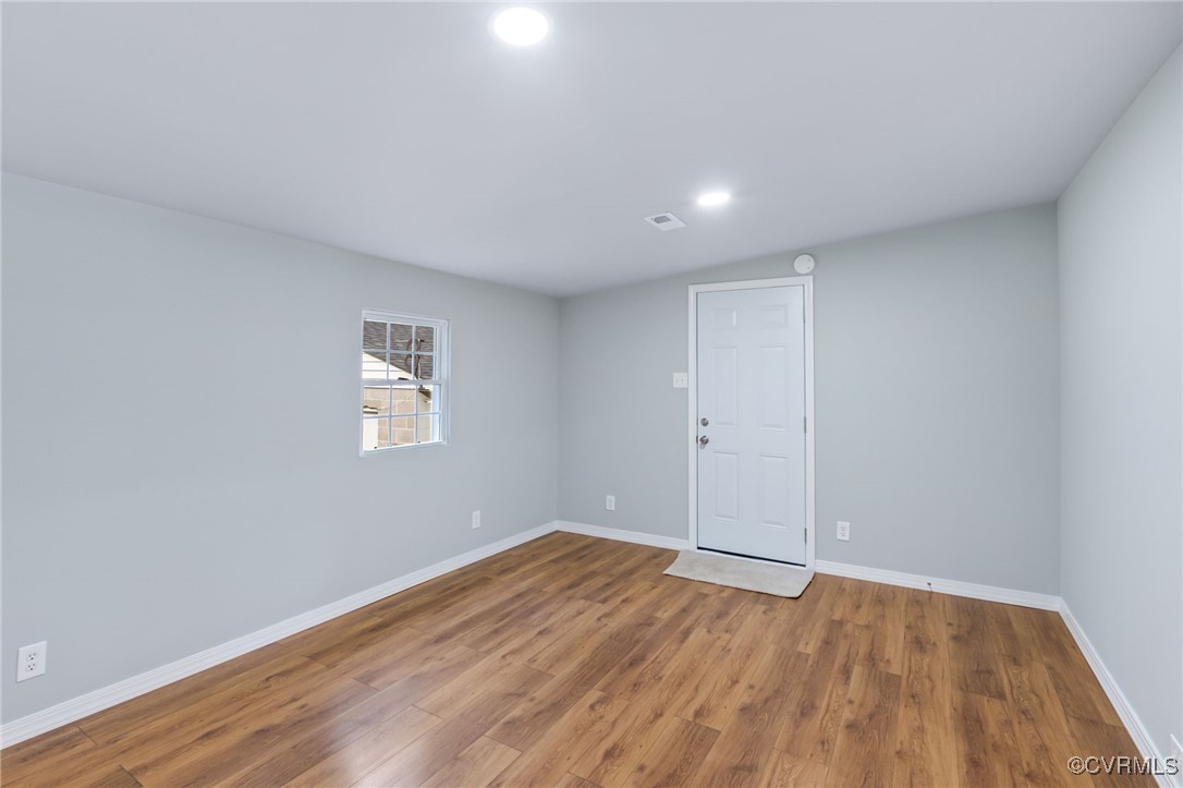 8600 Hickory Road Petersburg, VA 23803 - Photo 9 of 28 Empty room featuring hardwood / wood-style floorin