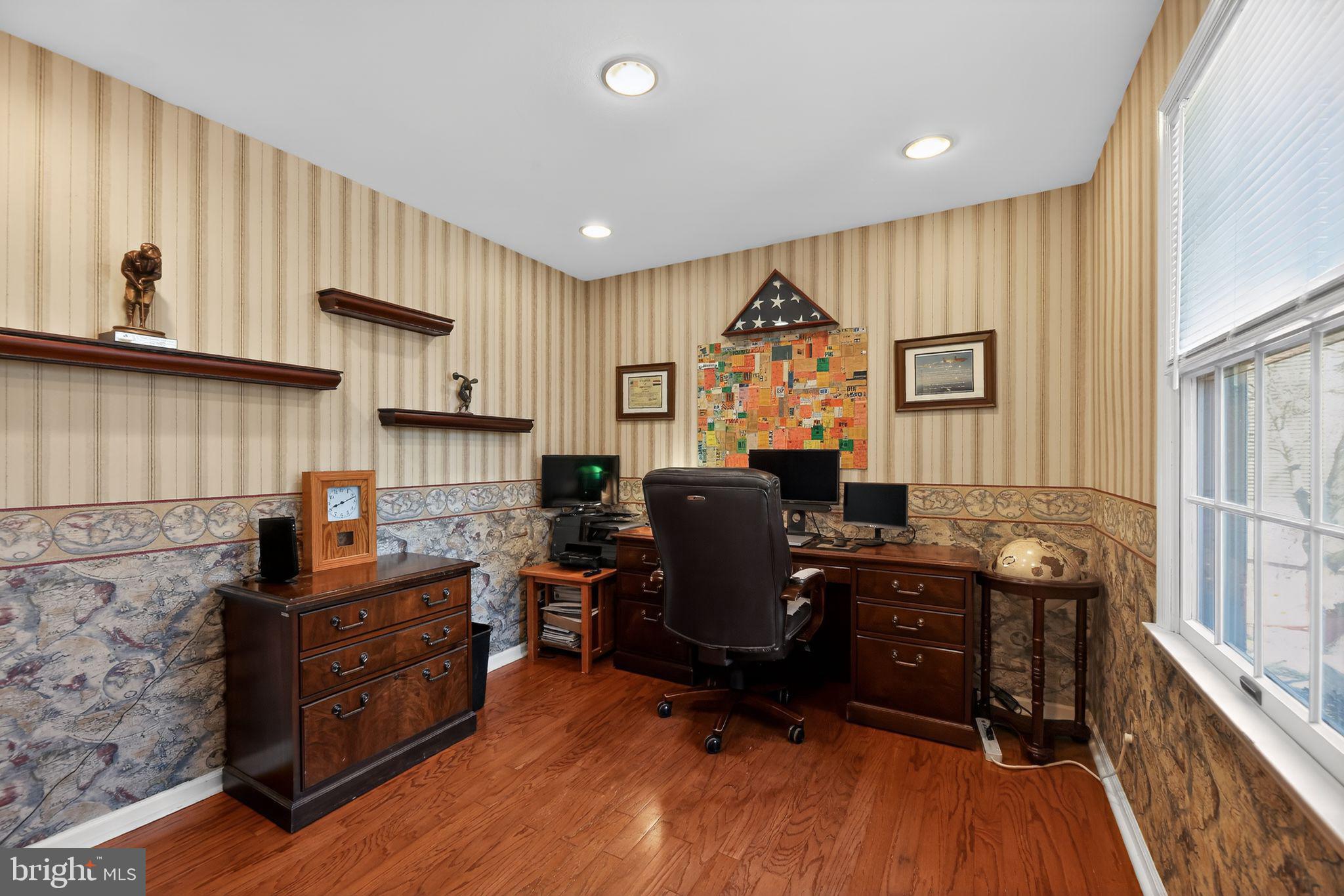 42 Callison Lane Voorhees, NJ 08043 - Photo 19 of 55 a view of a workspace with furniture and a window