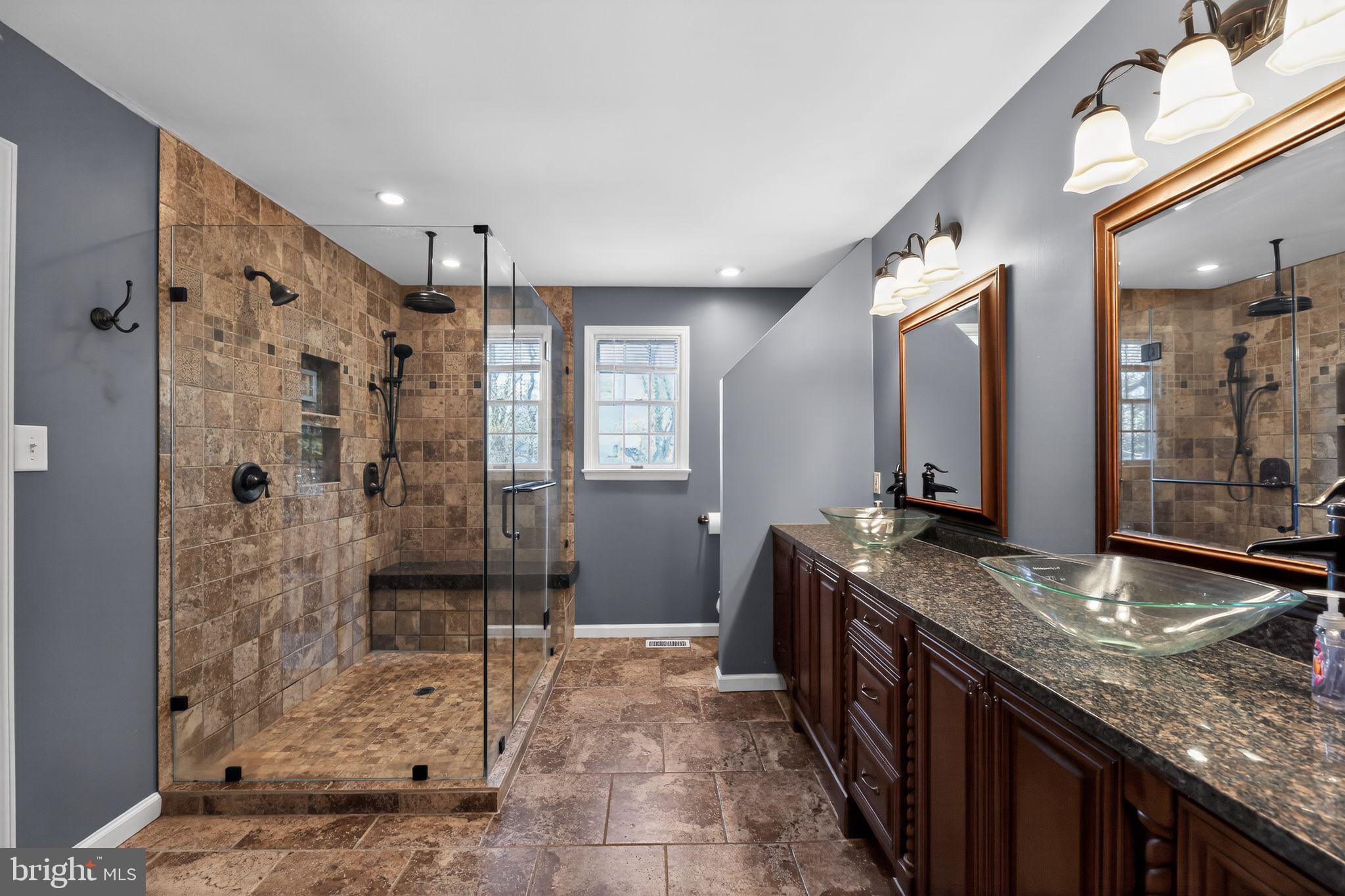 42 Callison Lane Voorhees, NJ 08043 - Photo 26 of 55 a spacious bathroom with a granite countertop sink mirror and shower