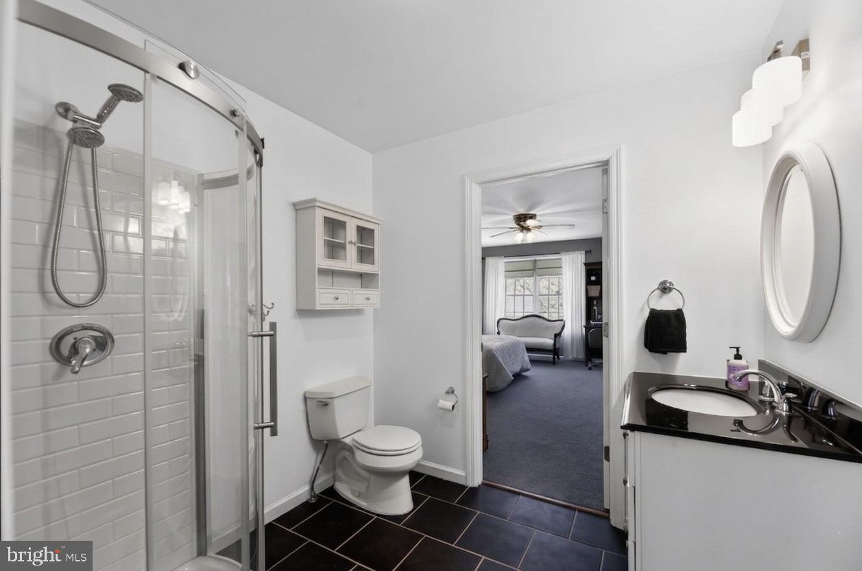 42 Callison Lane Voorhees, NJ 08043 - Photo 32 of 55 a en suite bathroom with a toilet sink and shower