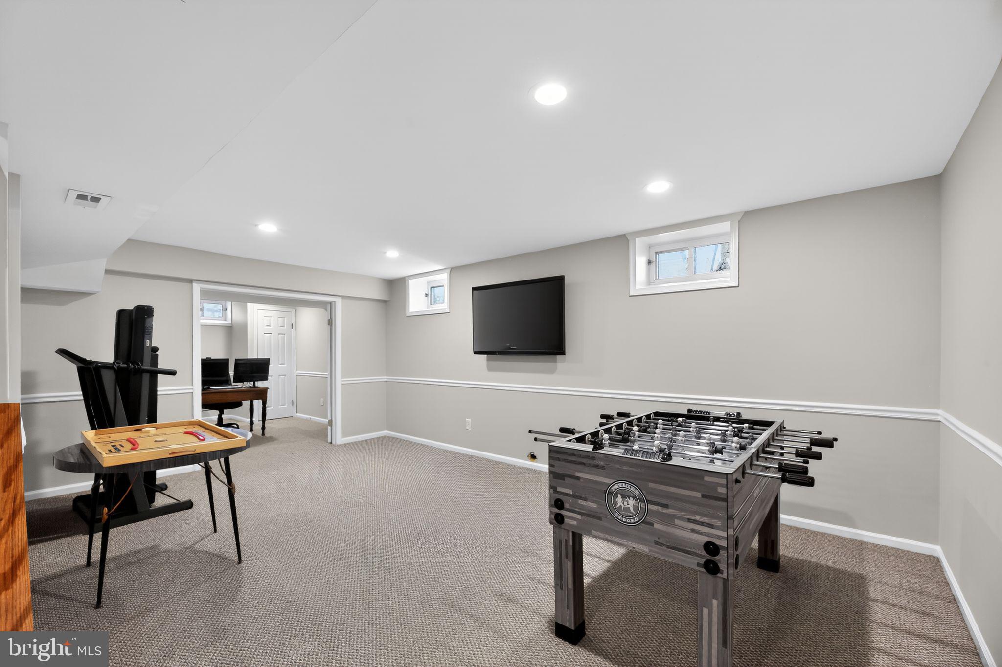 42 Callison Lane Voorhees, NJ 08043 - Photo 38 of 55 a living room with furniture and a flat screen tv