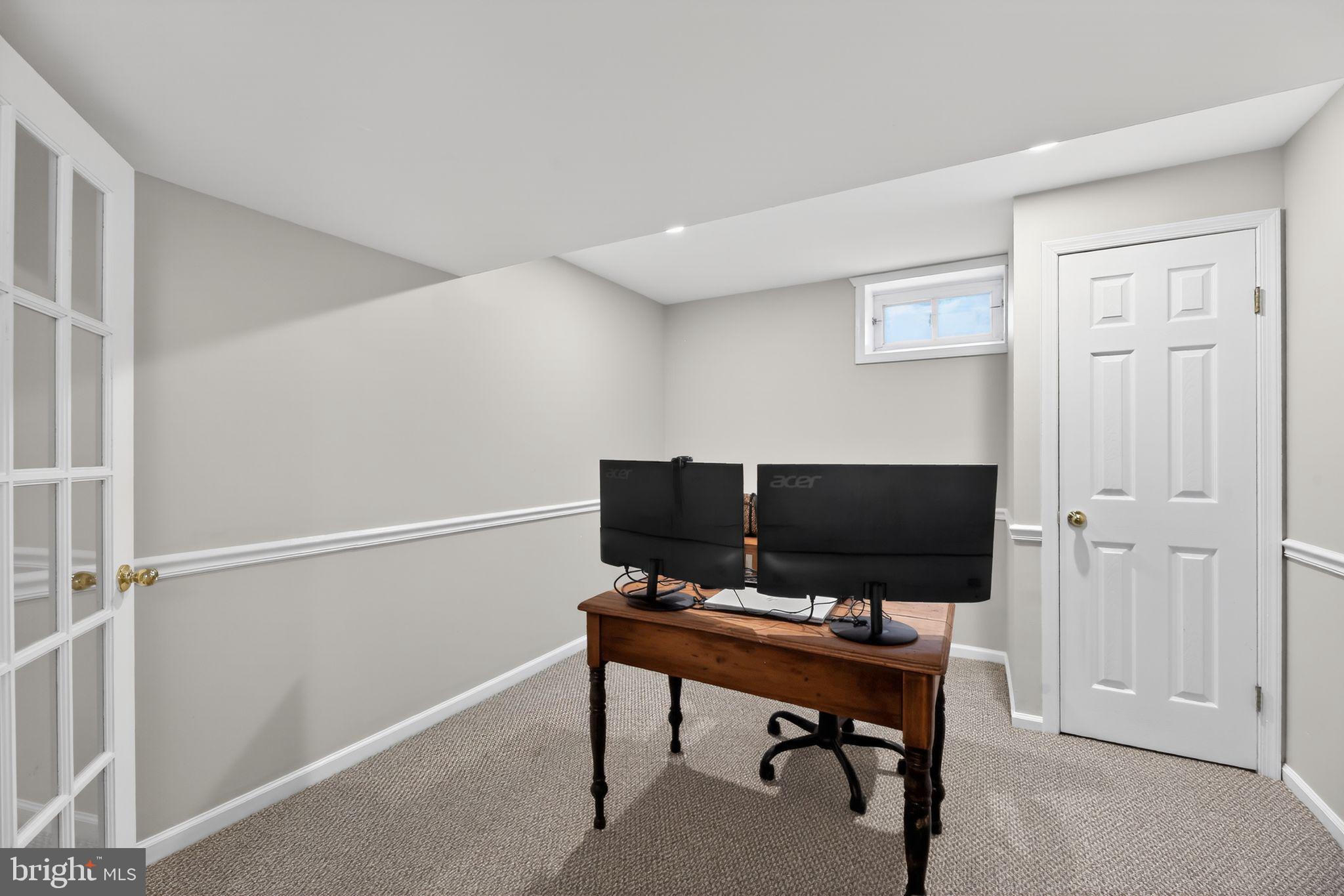 42 Callison Lane Voorhees, NJ 08043 - Photo 42 of 55 a view of a workspace with furniture and a window