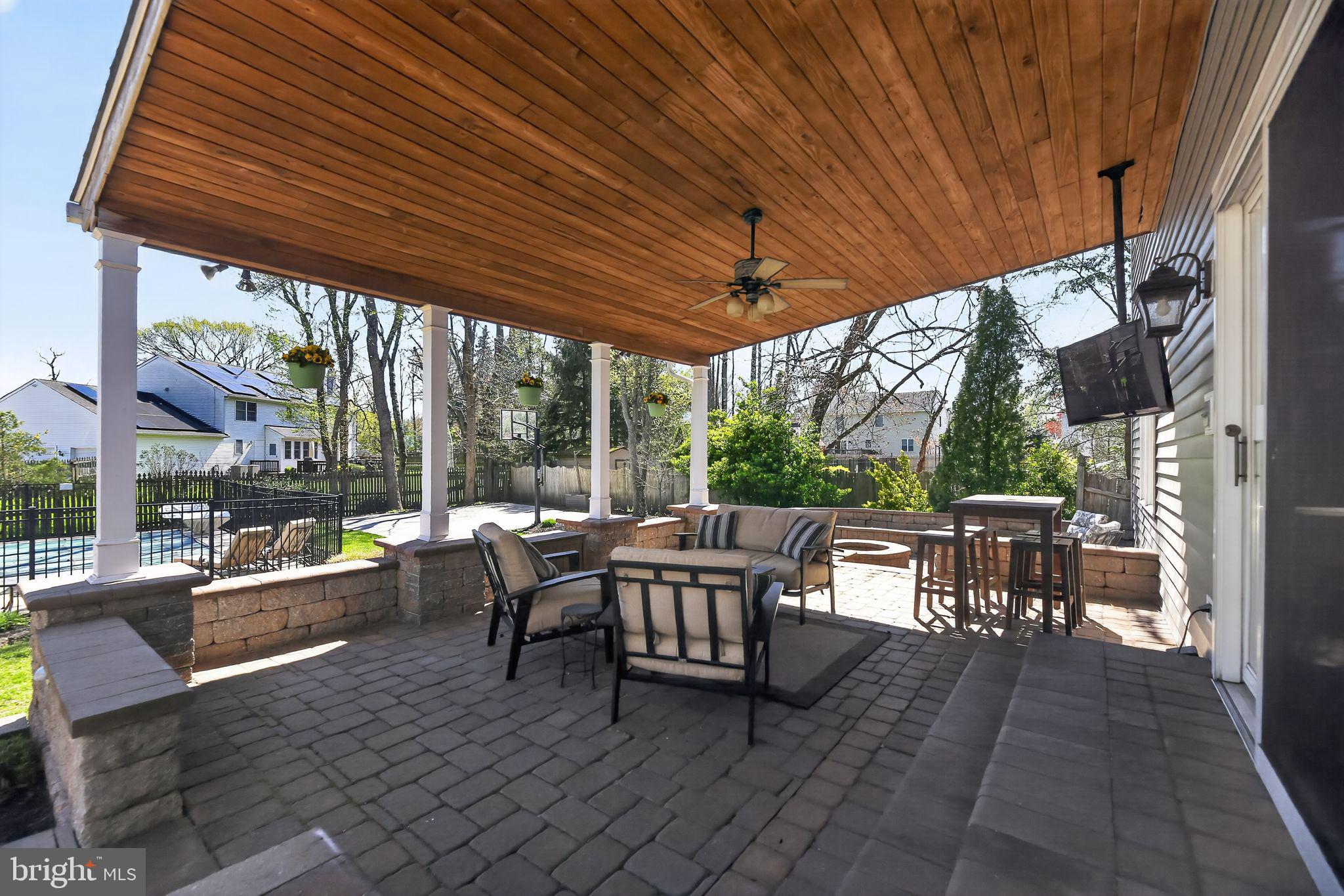 42 Callison Lane Voorhees, NJ 08043 - Photo 45 of 55 a outdoor space with lots of tables a large window and furniture