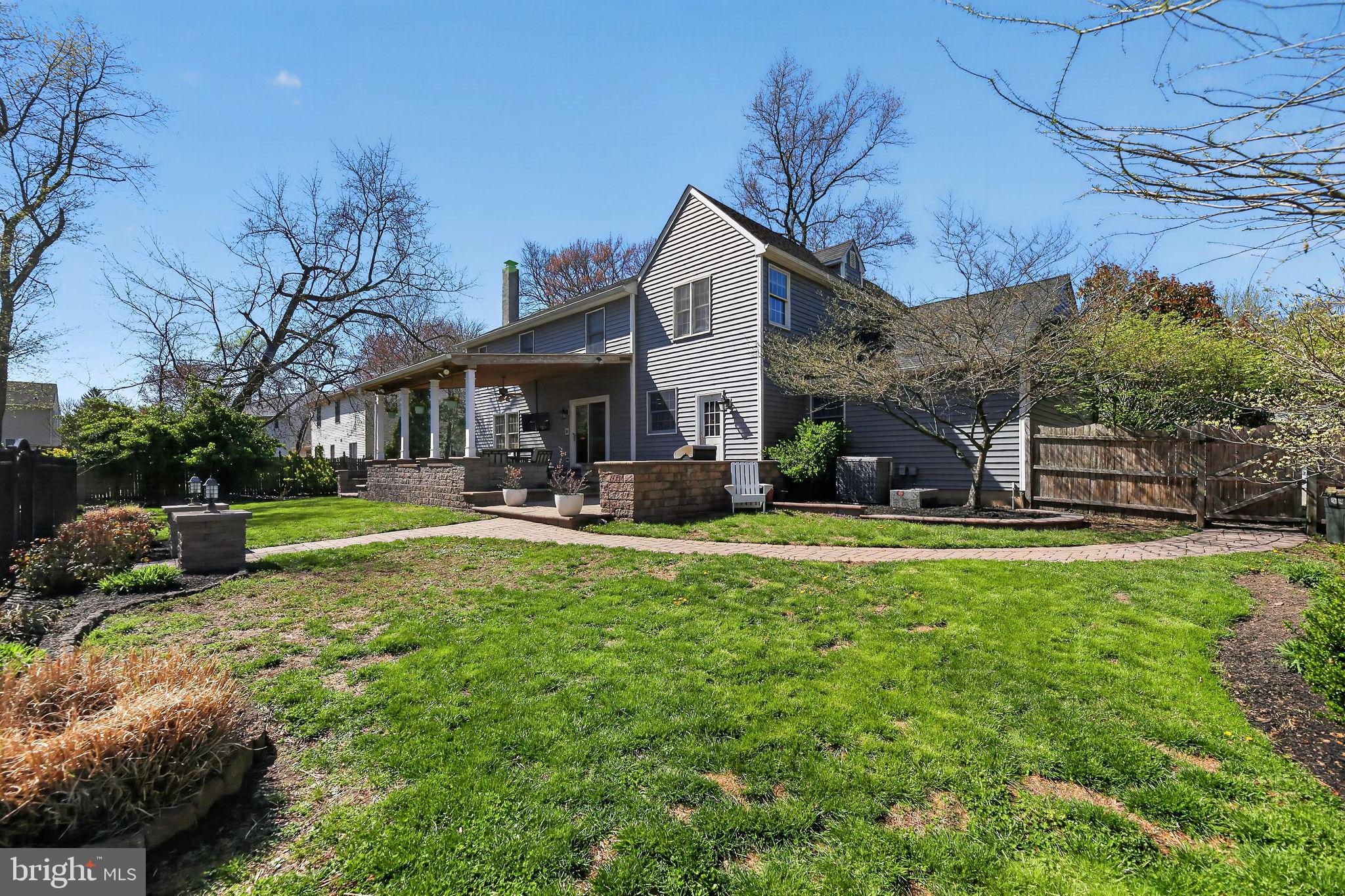 42 Callison Lane Voorhees, NJ 08043 - Photo 47 of 55 a swimming pool view with a seating space and a garden view