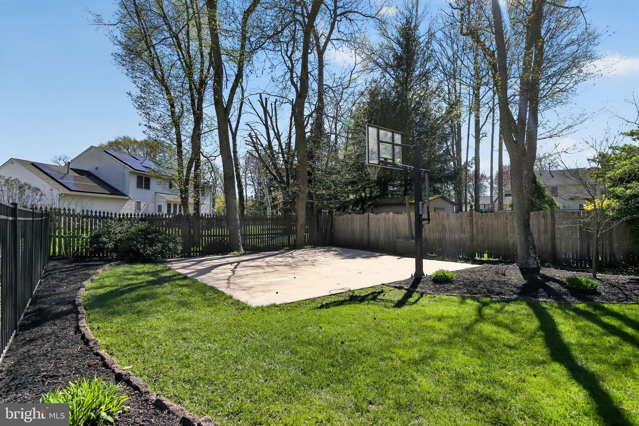 42 Callison Lane Voorhees, NJ 08043 - Photo 52 of 55 a view of a backyard with a table and chairs
