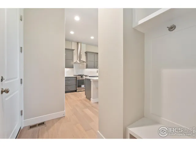 a bathroom with a sink a mirror and a vanity