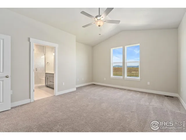 a bathroom with a double vanity sink mirror and shower