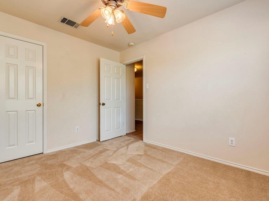 6 Verde Ranch Loop Leander, TX 78641 - Photo 16 of 24 Unfurnished bedroom featuring light colored carpet and ceiling fan
