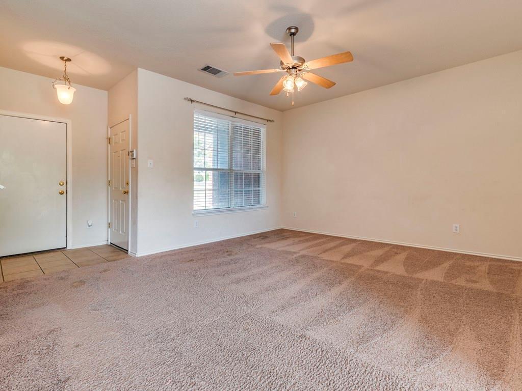 6 Verde Ranch Loop Leander, TX 78641 - Photo 8 of 24 Unfurnished room featuring light colored carpet and ceiling fan