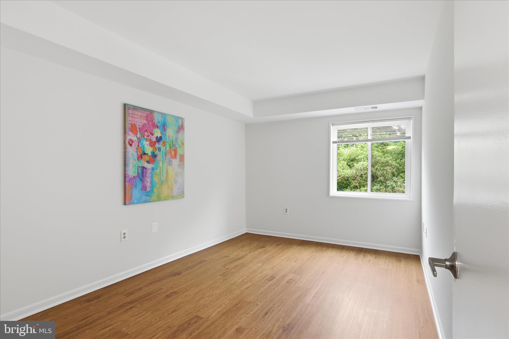 1540 Northgate Square, Unit 21B Reston, VA 20190 - Photo 15 of 24 an empty room with a window