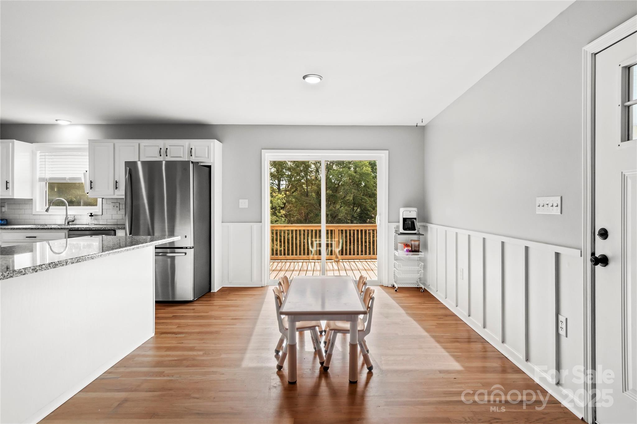 1627 Stony Knoll Road Dobson, NC 27017 - Photo 11 of 43 a view of a kitchen with a table and chairs