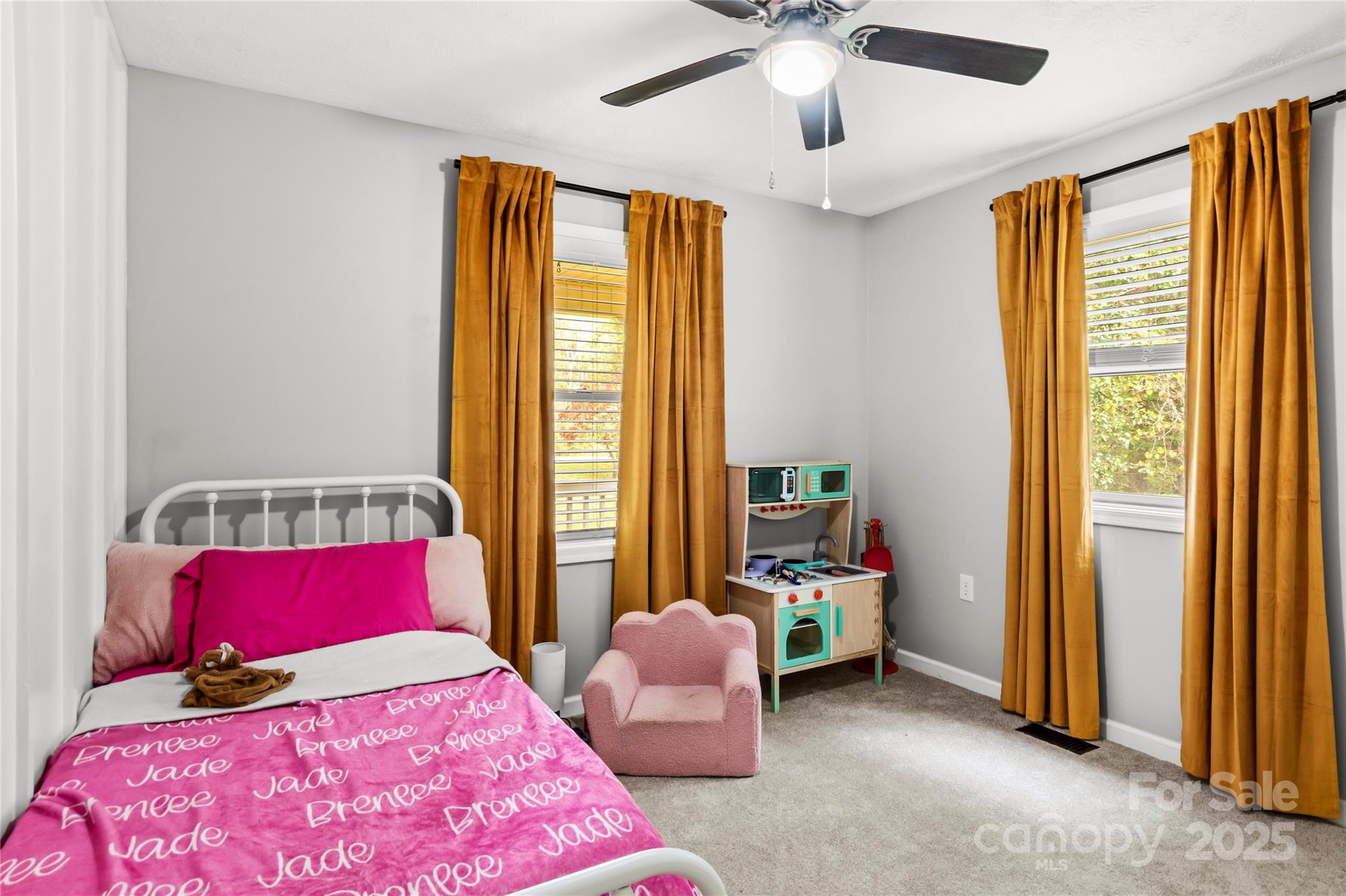 1627 Stony Knoll Road Dobson, NC 27017 - Photo 21 of 43 a bedroom with a bed and a window