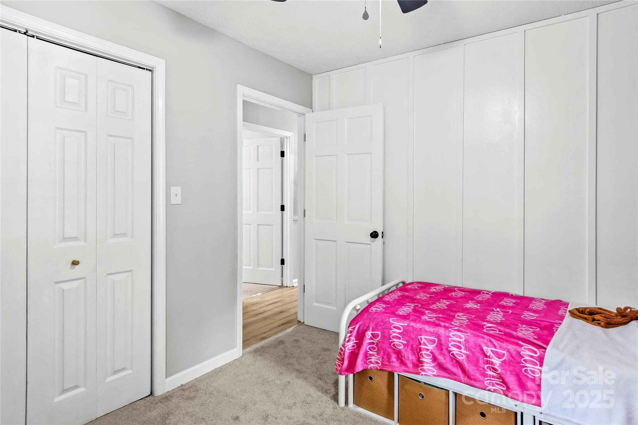 1627 Stony Knoll Road Dobson, NC 27017 - Photo 22 of 43 a bedroom with a bed and a closet