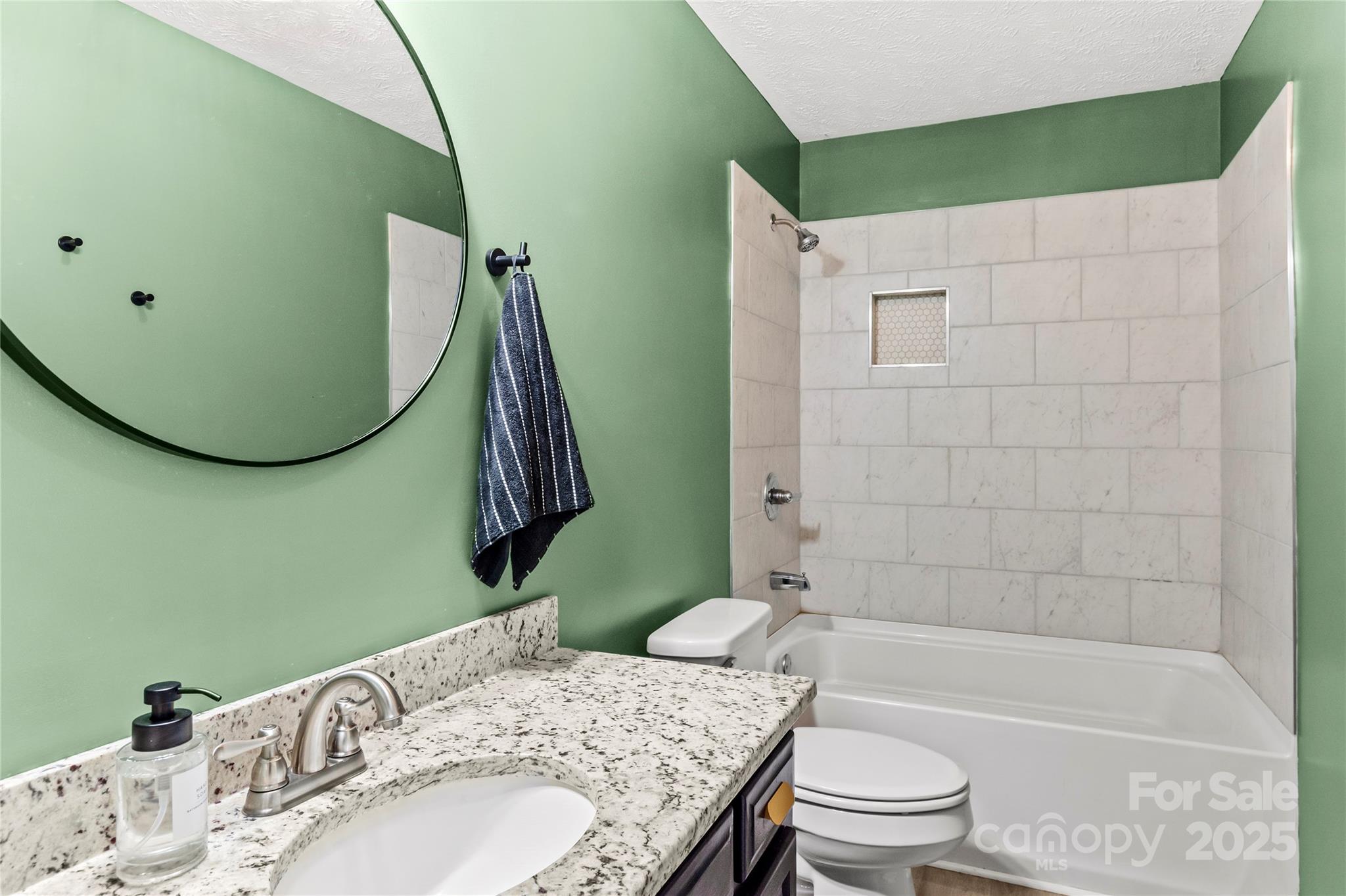 1627 Stony Knoll Road Dobson, NC 27017 - Photo 23 of 43 a bathroom with a sink and a mirror