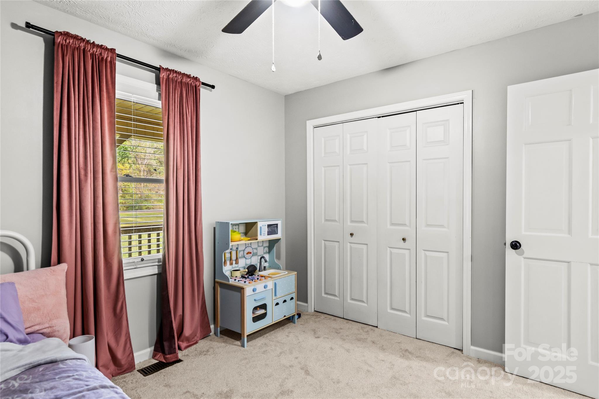 1627 Stony Knoll Road Dobson, NC 27017 - Photo 25 of 43 a view of room with furniture and a window