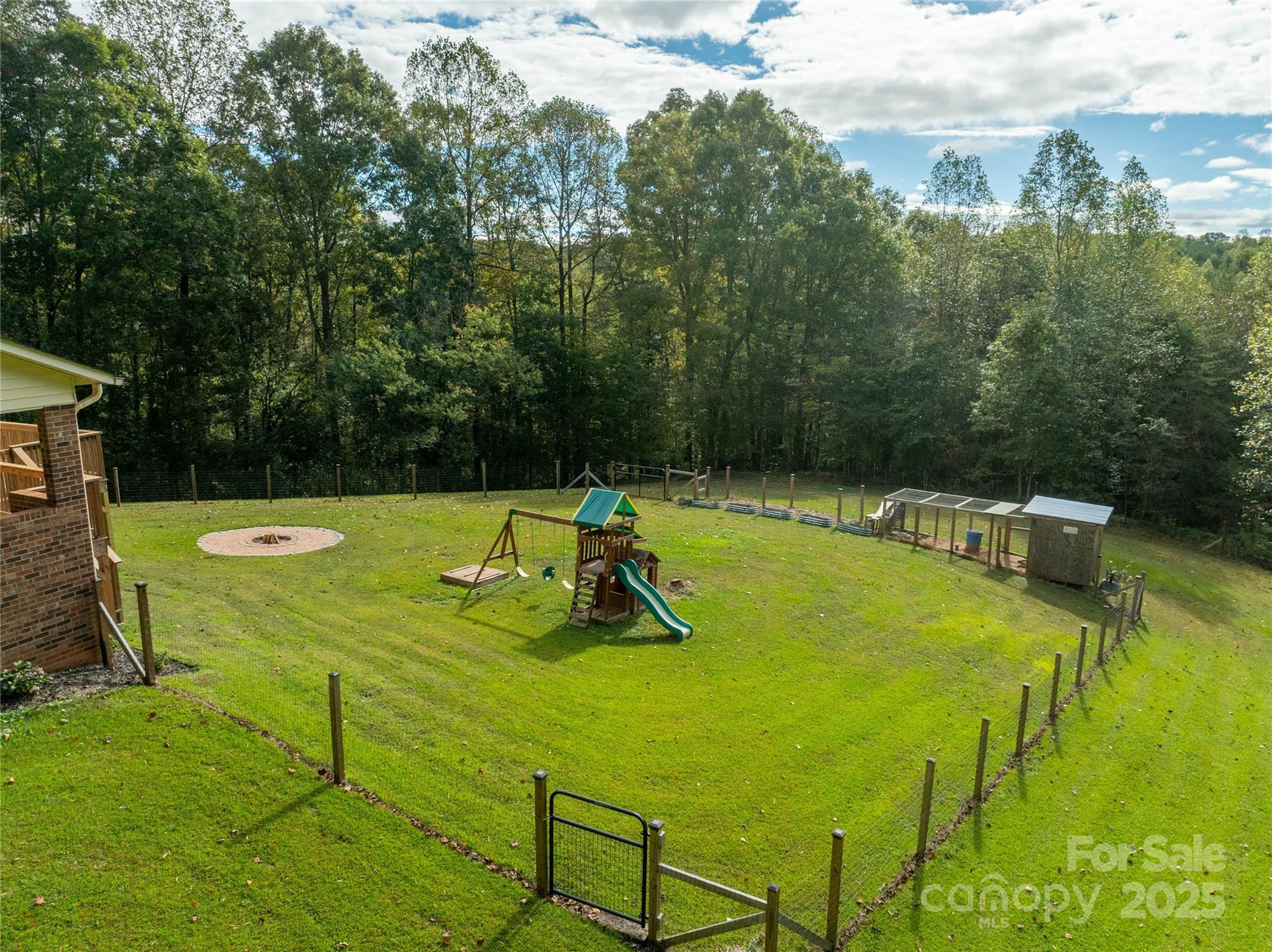 1627 Stony Knoll Road Dobson, NC 27017 - Photo 31 of 43 a view of a swimming pool with a yard