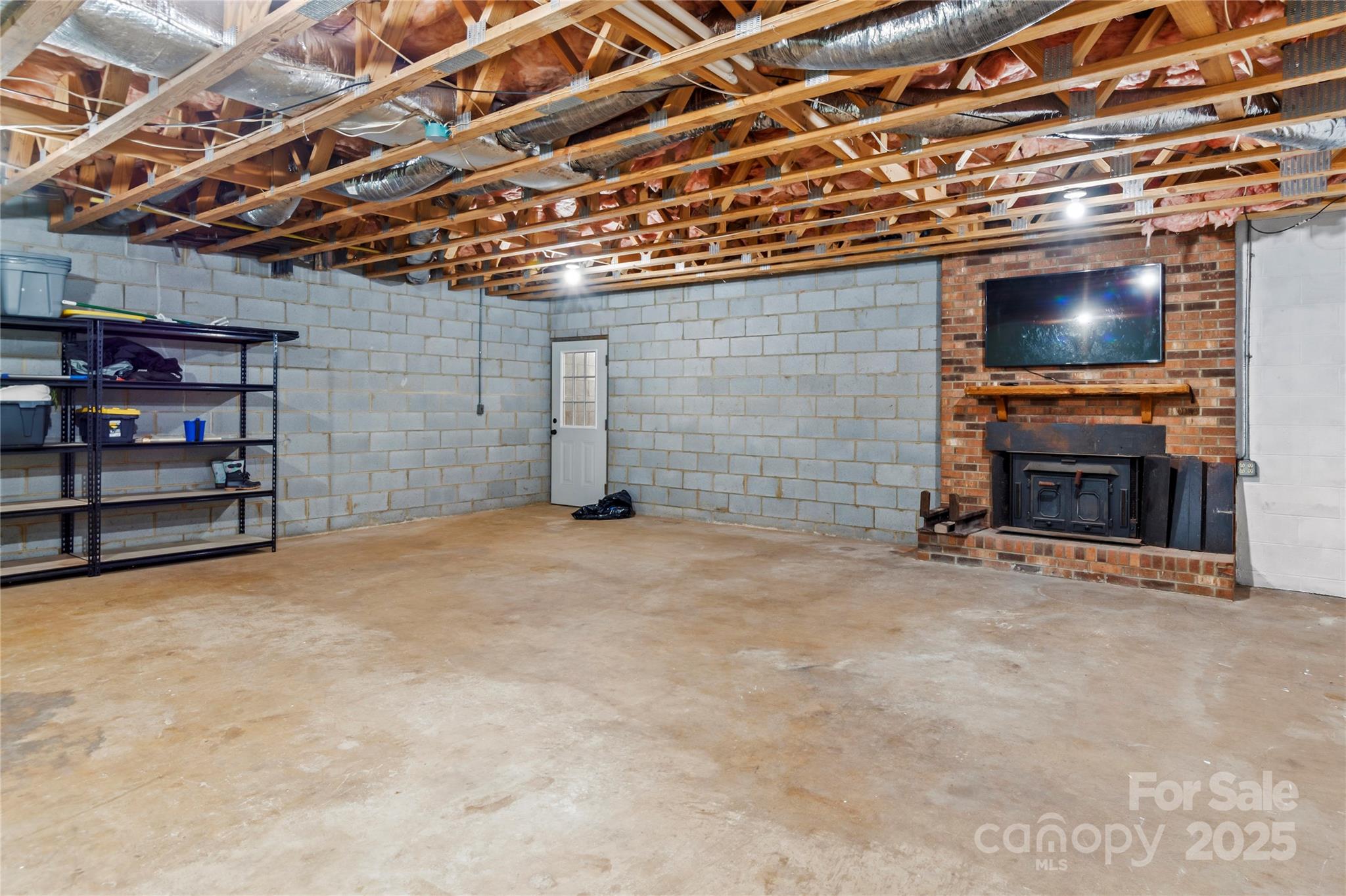 1627 Stony Knoll Road Dobson, NC 27017 - Photo 36 of 43 a view of a livingroom with furniture and a flat screen tv