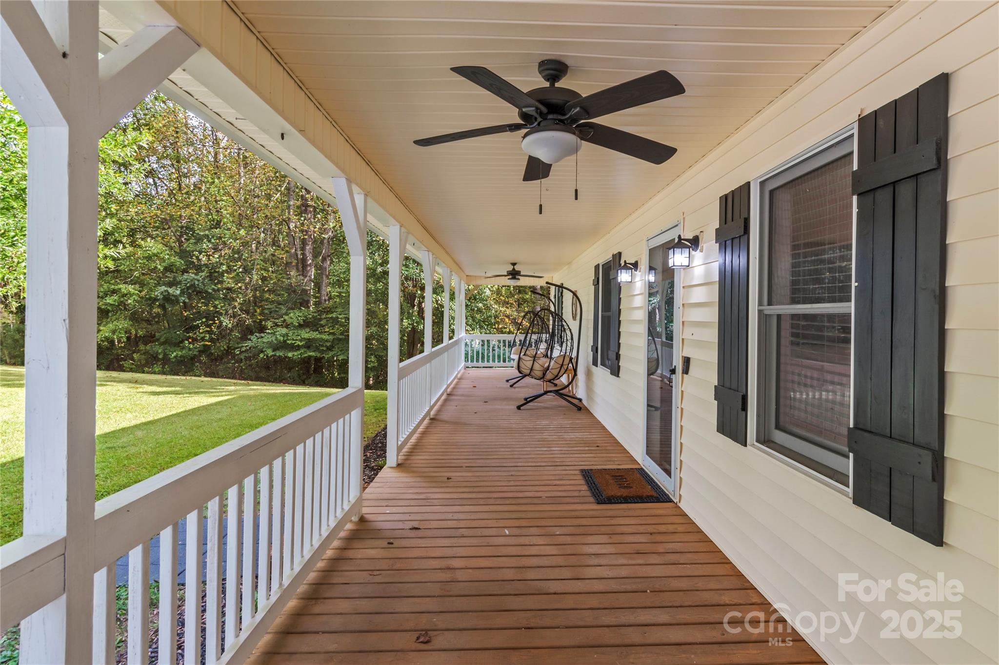 1627 Stony Knoll Road Dobson, NC 27017 - Photo 6 of 43 a view of a porch with wooden floor and outdoor space