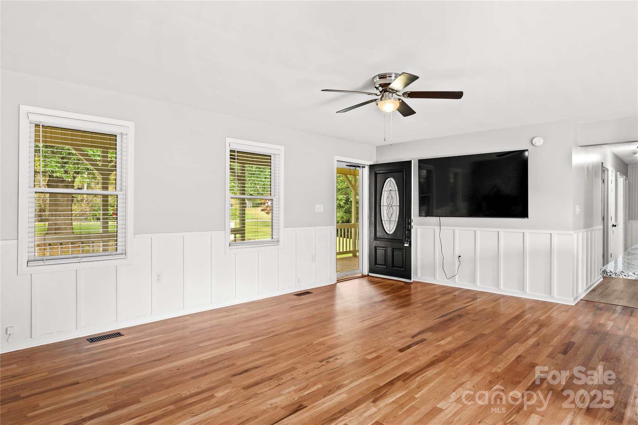 1627 Stony Knoll Road Dobson, NC 27017 - Photo 7 of 43 a view of a livingroom with a flat screen tv