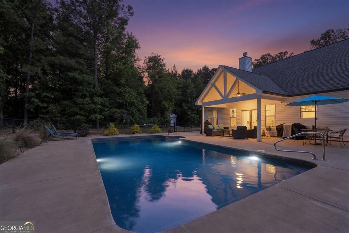 683 Teagle Road Forsyth, GA 31029 - Photo 4 of 50 a view of a house with swimming pool