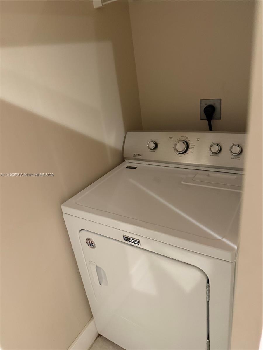 17150 North Bay Road, Unit 2102 Sunny Isles Beach, FL 33160 - Photo 19 of 29 a close up view of washer and dryer