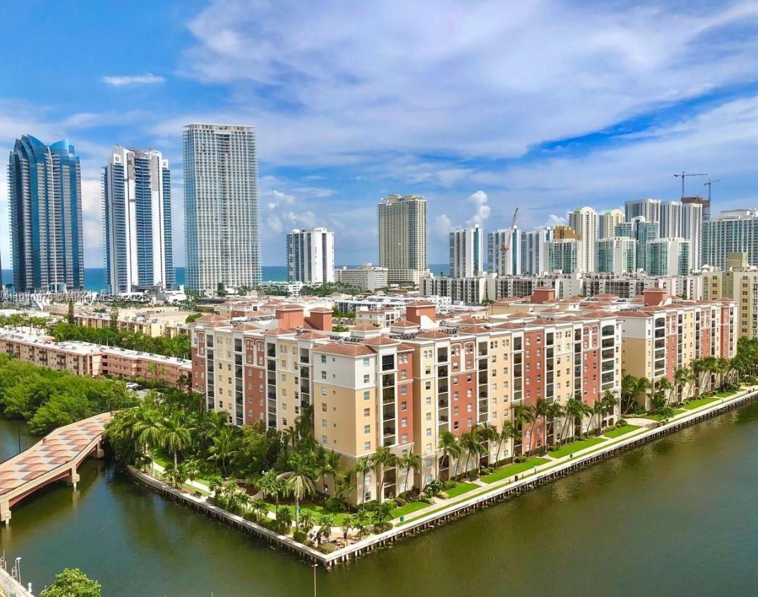 17150 North Bay Road, Unit 2102 Sunny Isles Beach, FL 33160 - Photo 29 of 29 a view of building with swimming pool and outdoor space