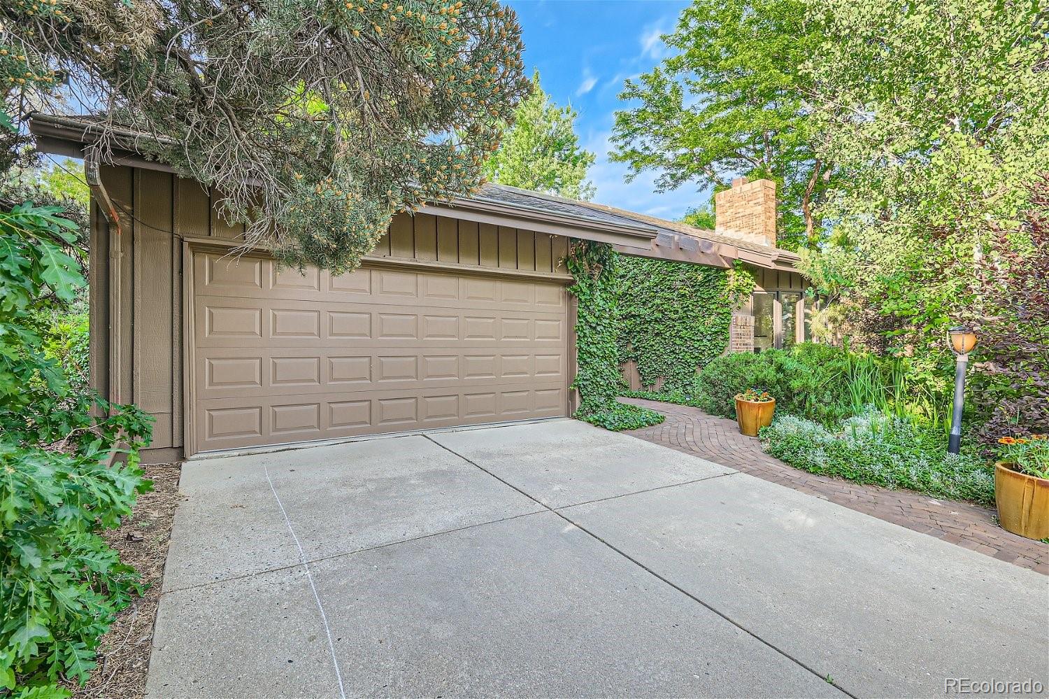 a view of backyard and garage