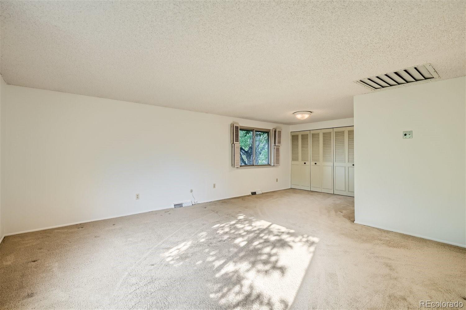 3398 East Easter Place Centennial, CO 80122 - Photo 15 of 28 an empty room with windows