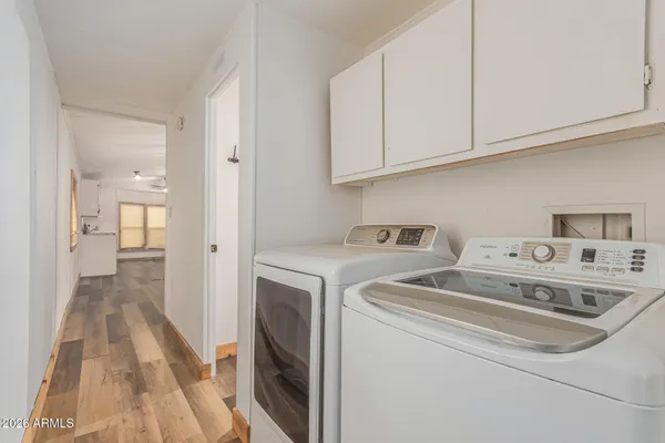 a utility room with dryer and washer