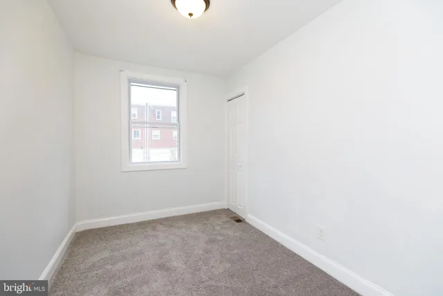 an empty room with a window