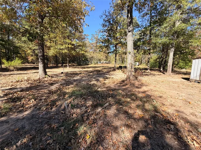 a view of swimming pool with a patio