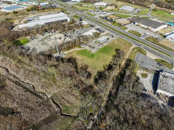 a aerial view of residential houses with outdoor space