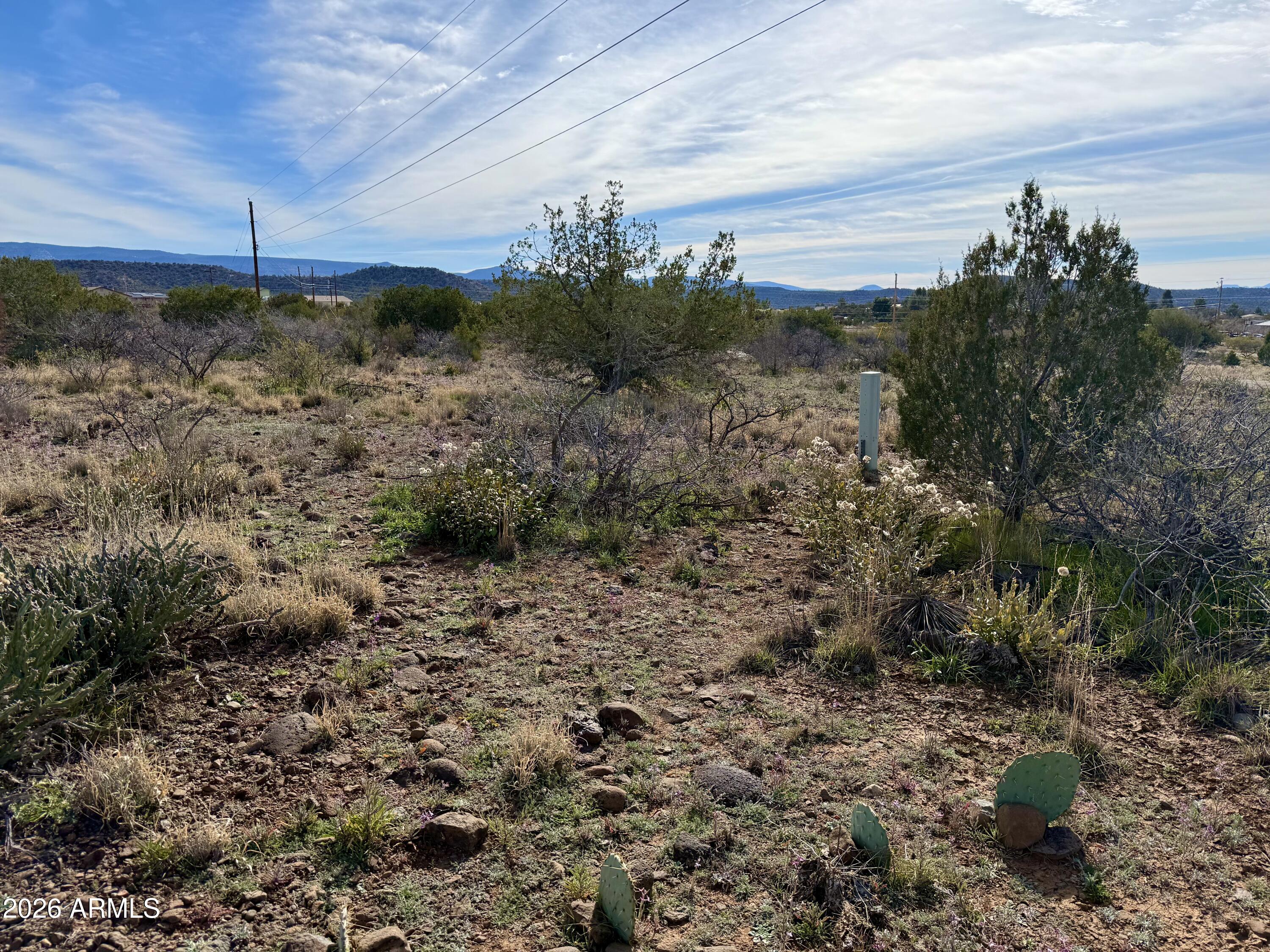 4790-4780 Smoke Signal Way, Unit 132 Rimrock, AZ 86335 - Photo 15 of 26 a view of a backyard of a house