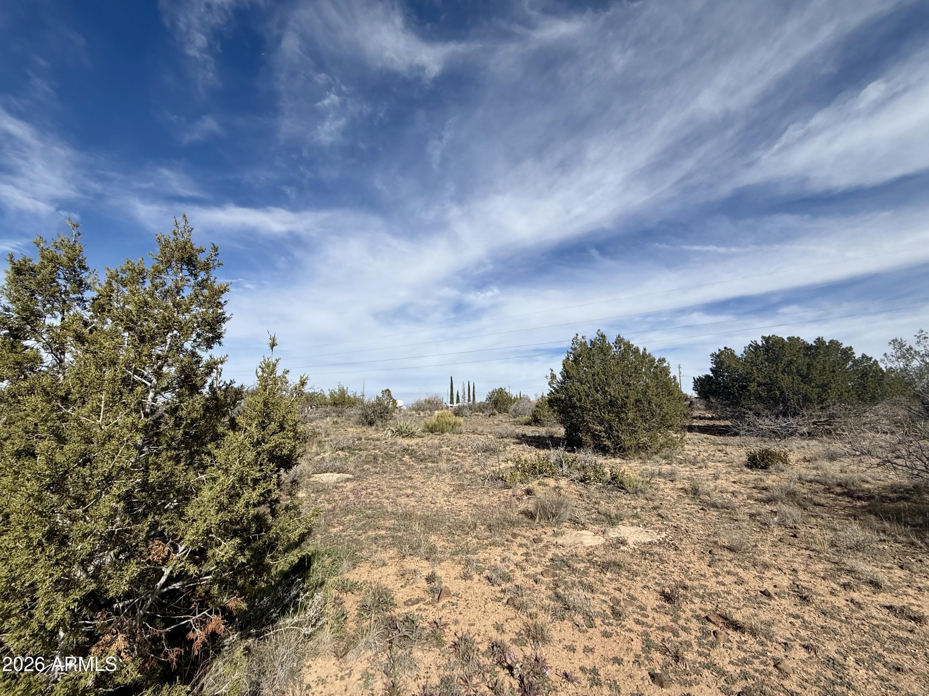 4790-4780 Smoke Signal Way, Unit 132 Rimrock, AZ 86335 - Photo 8 of 26 a view of a large building with a mountain in the background