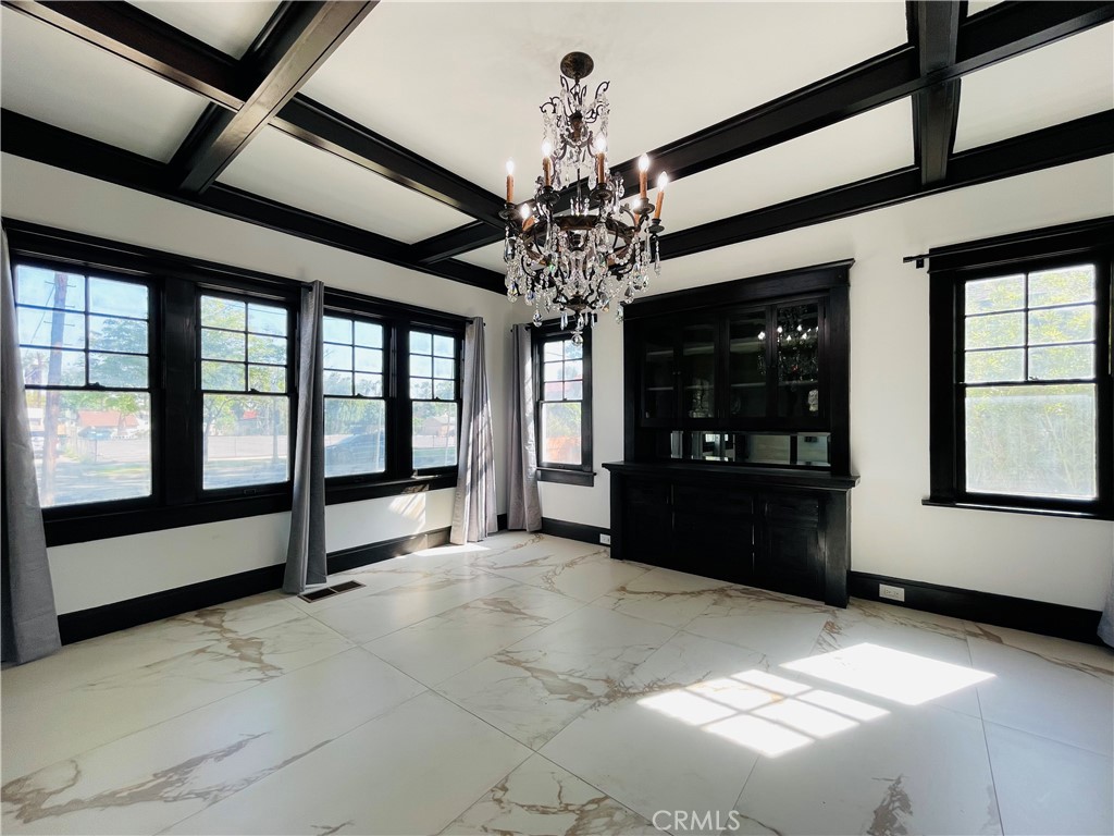 3225 Locust Street Riverside, CA 92501 - Photo 15 of 63 a view of a big room with windows and chandelier