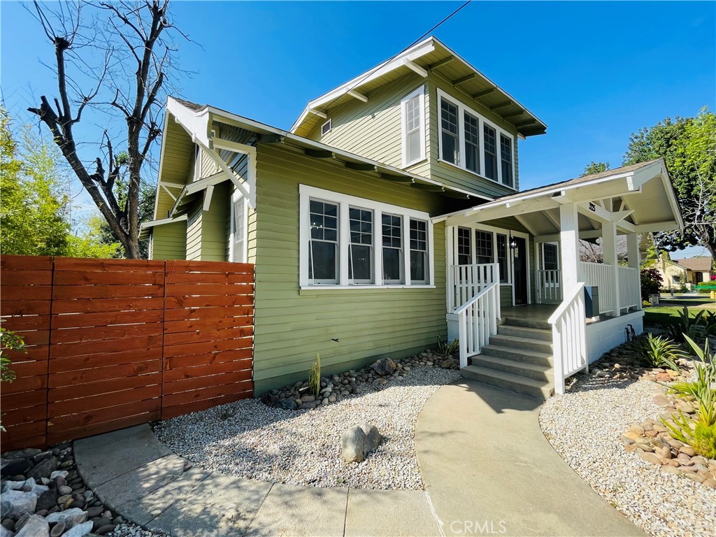 3225 Locust Street Riverside, CA 92501 - Photo 2 of 63 a front view of a house with a yard