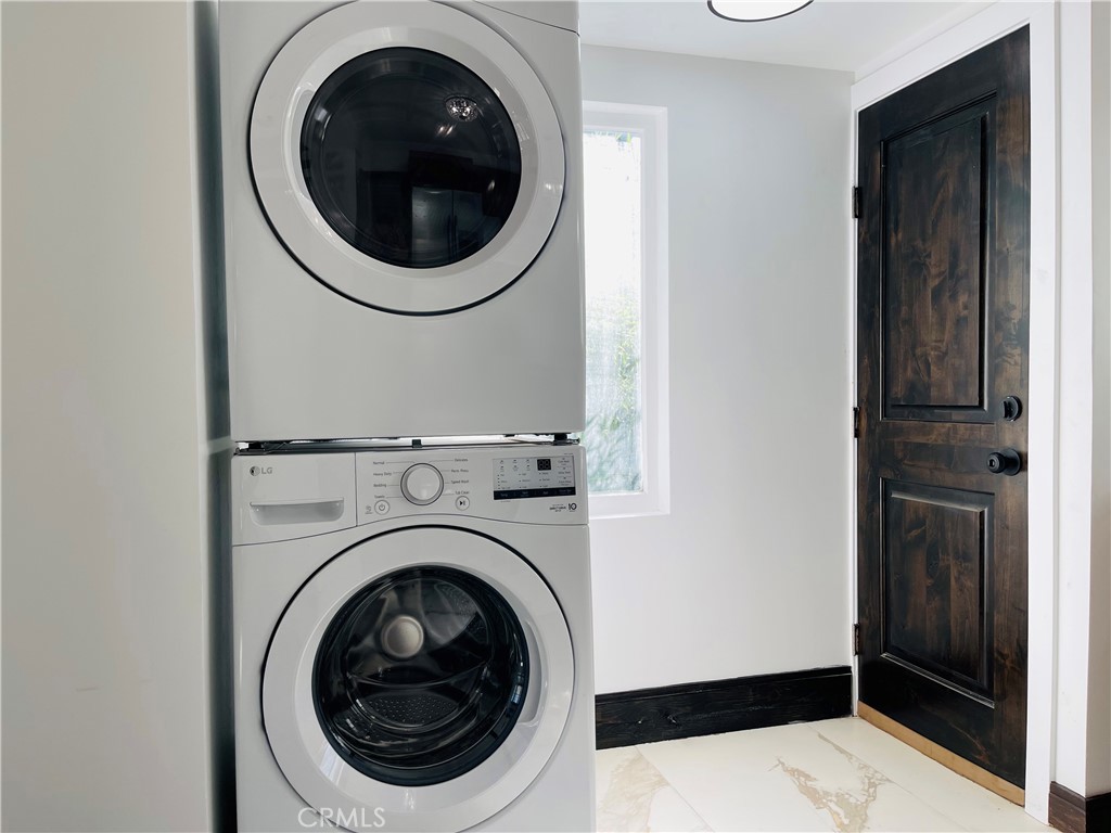 3225 Locust Street Riverside, CA 92501 - Photo 24 of 63 a close view of a utility room with dryer and washer