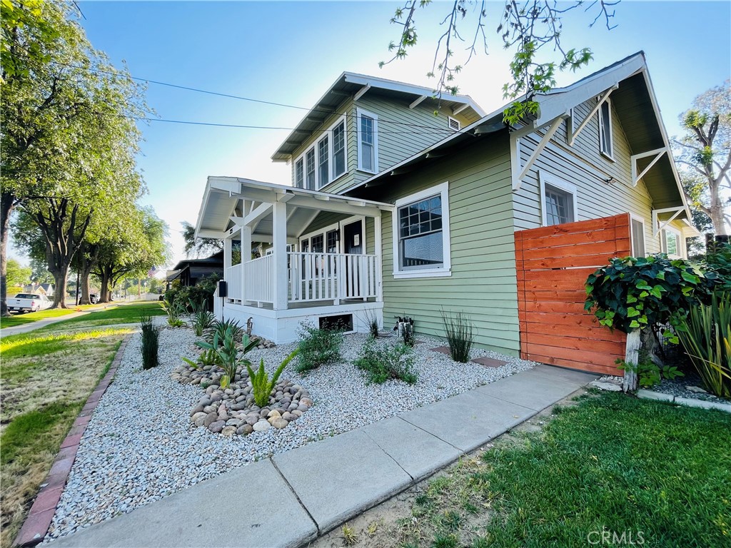 3225 Locust Street Riverside, CA 92501 - Photo 3 of 63 a front view of a house with garden
