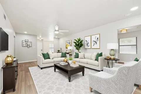 a bedroom with a bed and a book shelf
