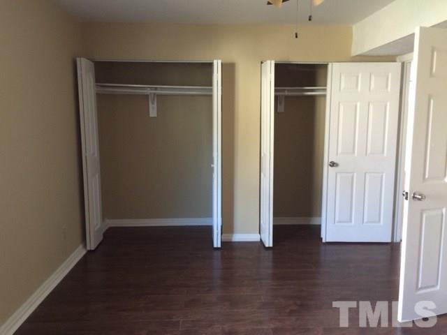 5109 Dice Drive Raleigh, NC 27616 - Photo 14 of 22 an empty room with wooden floor & closet area