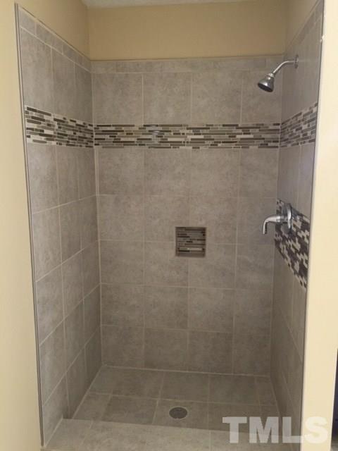 5109 Dice Drive Raleigh, NC 27616 - Photo 16 of 22 a bathroom with a shower